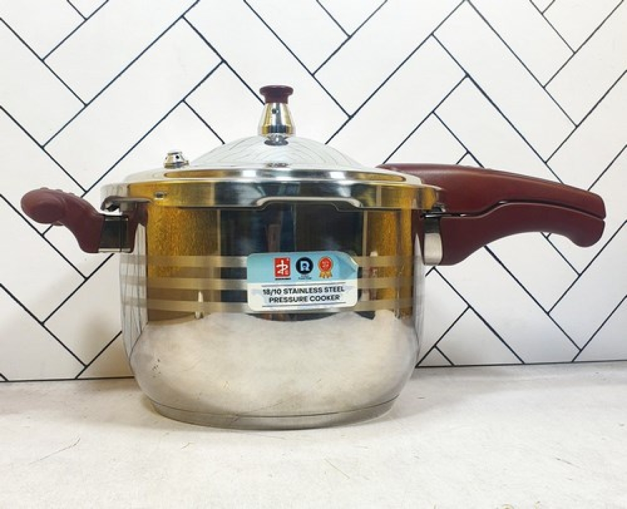 زودپز7لیتر تکدسته قرمز 24cm استیل نگیر زومبا 18 ماه گارانتی
